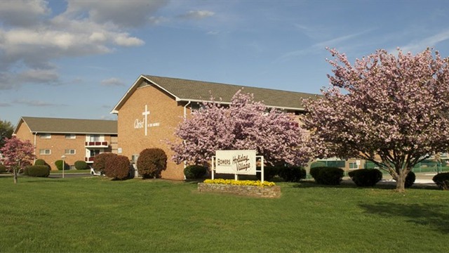 Bowers Holiday Village buildings with blooming trees